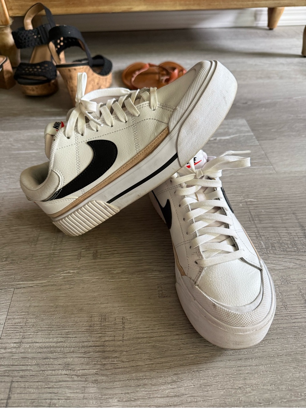 Nike Women’s White Sneakers with Black Swoosh and Tan Trim